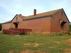 The Eleanor Roosevelt School in Warm Springs was built in 1936 and opened in 1937. It was the last Rosenwald school built in the United States using funds provided by the Julius Rosenwald Fund. The school operated from 1937 until 1972. The building was purchased privately in 1977. It was added to the National Register of Historic Places on May 3, 2010.