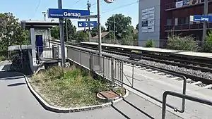 Double-tracked railway line with side platforms