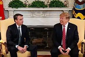 Image 104Brazilian President Jair Bolsonaro and United States President Donald Trump in 2019. Both leaders are emblematic of a wave of neo-nationalist and globalisation-weary conservative populism in the second half of the decade. (from 2010s)