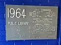 Plaque from 1964 details those involved in creating the new building.