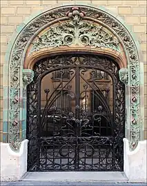 French Art Nouveau - Entrance decorated with glazed tiles of the Les Chardons Building (Rue Eugène-Manuel no. 2), Paris, 1903, by Charles Klein