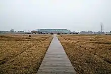 Entrance of the chengtoushan ruins.jpg