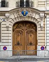 The Coat of arms of Ireland is featured above the entrance to the Embassy.