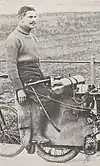 A man sitting on a motorcycle