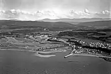 Aerial image of Cap-Chat. Mountains in the background.