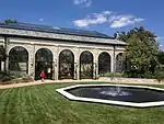 Ewing and Muriel Kauffman Memorial Garden main building and courtyard fountain from the southwest