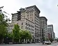 Felt Building (center-left) and the twin Boston and Newhouse Buildings (center-right)