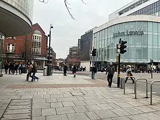 John Lewis Building, adjacent to Waterstones in the busy high street.