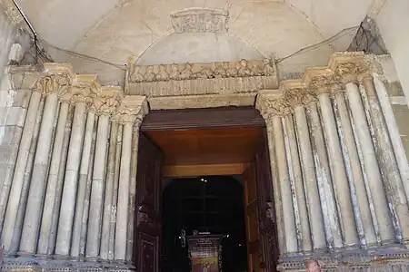 The West Portal, beneath a sculpture of the Last Supper (12th c.)