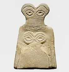 Eye idol; 3700–3500 BC; gypsum alabaster; 6.5 × 4.2 × 0.6 cm; Metropolitan Museum of Art