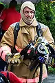 A CBPR firefighter preparing to enter a flaming building.