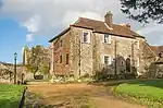 St. Radegund's Abbey Farmhouse and outhouse