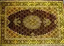 A Tabriz carpet with a fish design medallion