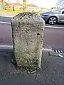 London Road milestone opposite Figges Marsh, looking east