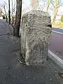 London Road milestone opposite Figges Marsh, looking north