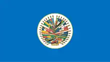 Seal of the Organization of American States on a blue background.