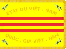 Flag of the Vietnamese National Army, with a dragon in each corner