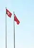 The flag of Hong Kong flying beside the national PRC flag