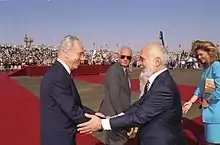 Shimon Peres (left) with Yitzhak Rabin (center) and King Hussein of Jordan (right), prior to signing the Israel–Jordan peace treaty.