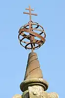 Detail of armillary sphere and cardinal's cross