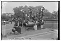 Medical corps posing on 15-inch Rodman gun