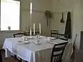 The dining room inside the commanding officer's quarters.