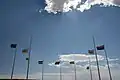 The flag of Colorado (third pole from left) alongside others at the Four Corners Monument