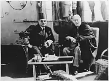 Franklin_D._Roosevelt_and_King_Farouk_of_Egypt_at_Great_Bitter_Lake_in_Egypt_-_NARA_-_196056