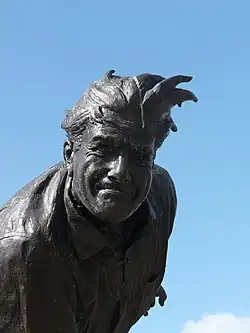 A statue of England bowler Fred Trueman in bowling pose