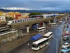 Buses and a train at Fruitvale station, 2018