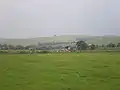 Pasture meadow (foreground) and football pitch in Volica (background)