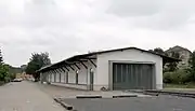 Radebeul Ost station: old goods shed; goods hall from the other side, entrance gate