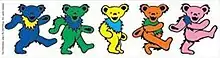 Five differently-colored cartoon teddy bears march in line.