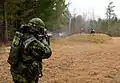 A GGFG soldier engaging a target during live fire training.