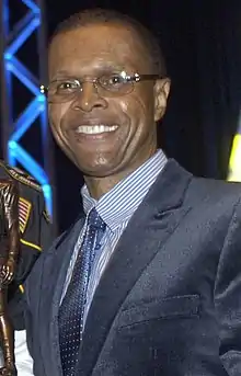 Gale Sayers giving a speech in 2008