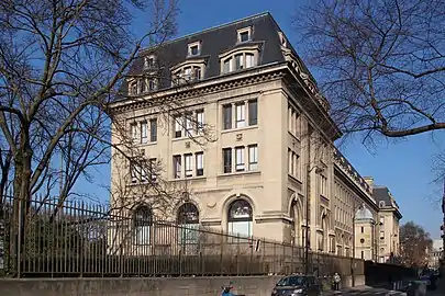 The Gallery of Botany. At left is the Robinia pseudoacacia, one of the oldest two trees in Paris,  planted in 1635 by Vespasien Robin