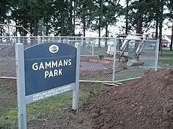 The sign for Gammans Park, with a new carousel under construction in the background