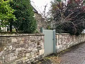 The front wall of St Cross