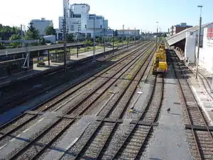 Island platform surrounded by railway tracks