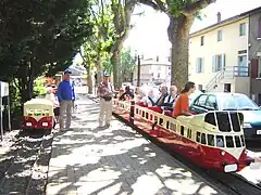 View of the main station of the tourist railway Anse Pont with two trains in station