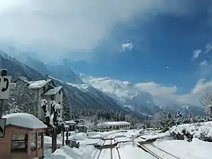 Single-story shelter on side platform in the snow