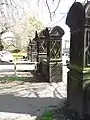 A set of 7 gate piers stand at the Stanningley Road entrance