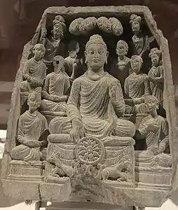 Statue of Gautama Buddha delivering his first sermon in the deer park at Sarnath, Varanasi