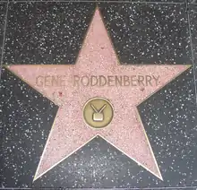 A star shaped paving slab, with the words "Gene Roddenberry" above the middle.