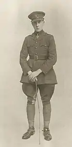 A black and white photograph of a young man in a military uniform.