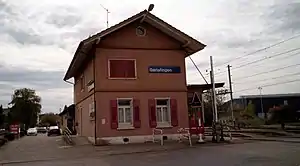 Two-story building with gabled roof