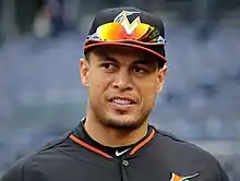 Giancarlo Stanton wearing black Marlins uniform during 2015 season