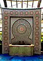 A traditional Moroccan fountain inside the conservatory