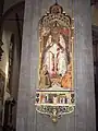 Saint Zenobius seated with his deacons St. Crescentius and St. Eugenius kneeling at either side. Painting on a pillar in the Duomo Santa Maria del Fiore, Florence.