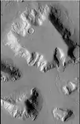 Mesa in Ismenius Lacus quadrangle, as seen by CTX.  Mesa has several glaciers eroding it.